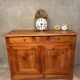 Small cherry wood sideboard in golden honey color