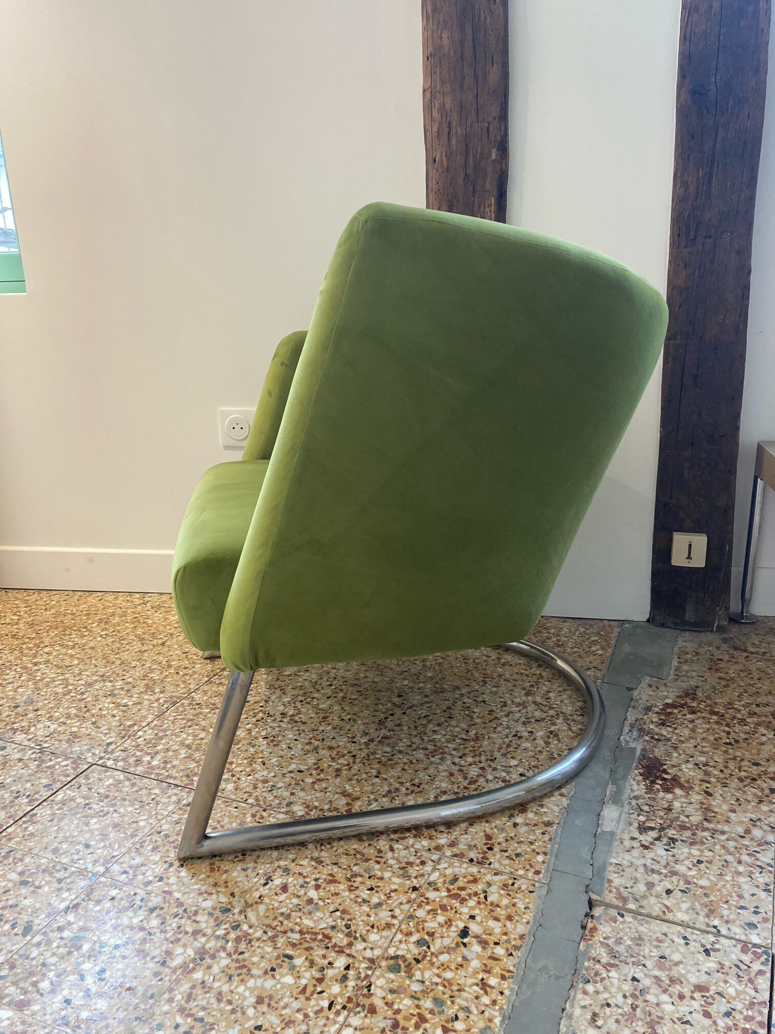 Erling Revheim, Armchair model "Spiral" in chrome tubular metal and green fabric