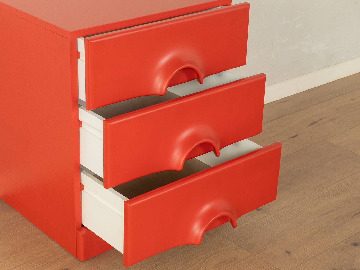 Red chest of drawers by Schönbuch in characteristic Space Age design from the 1970s