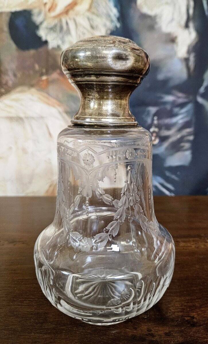 Pair of antique Louis XVI style bottles in finely engraved crystal and silver.