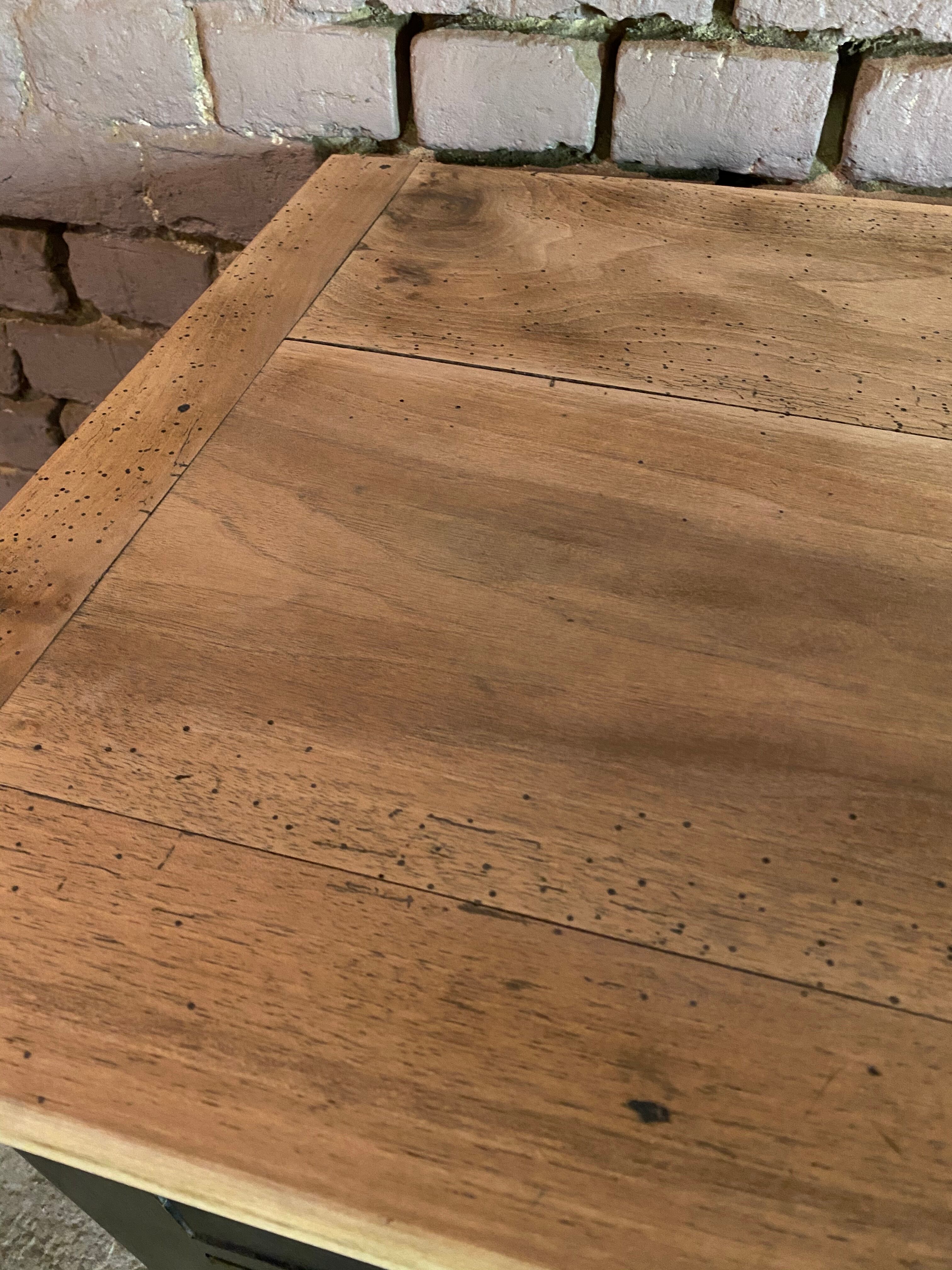 Old black patinated chest of drawers