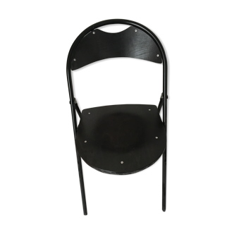 Black folding wooden chair