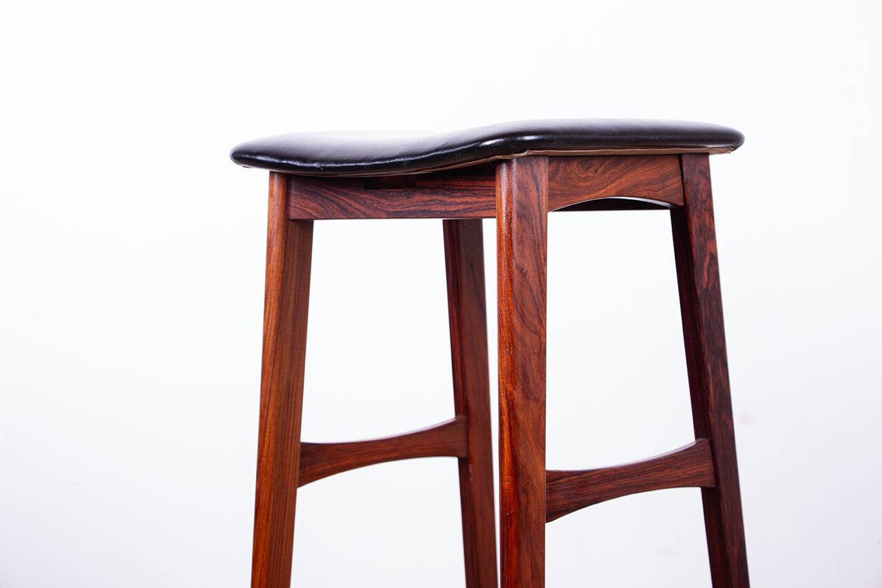 4 Danish high stools, rosewood and black leather, Knud Bent for Dyrlund.