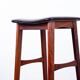 4 Danish high stools, rosewood and black leather, Knud Bent for Dyrlund.