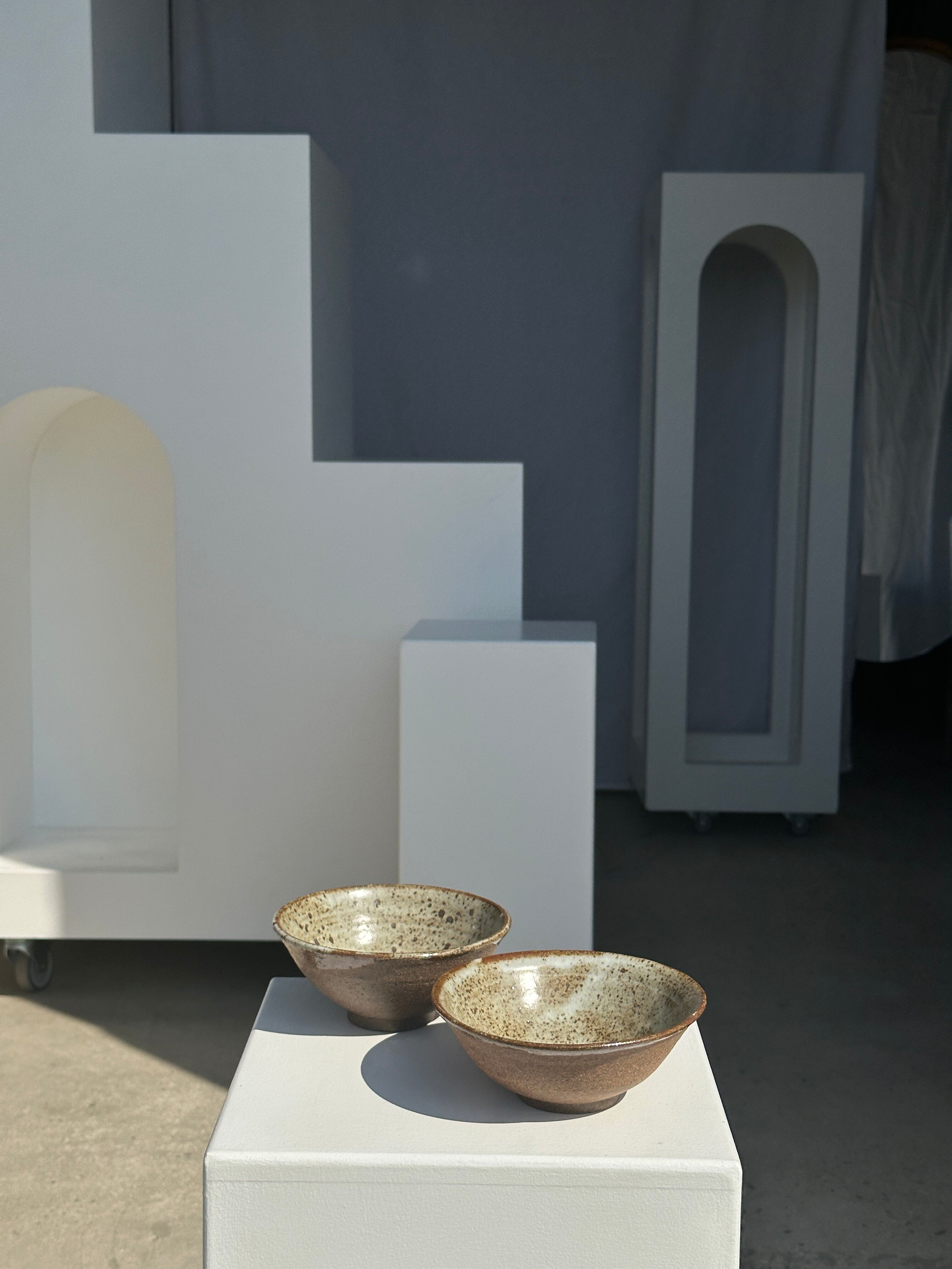 Duo of ceramic bowls interior glazed exterior matt raw earth