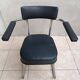 Vintage office chair in chrome metal and faux leather.