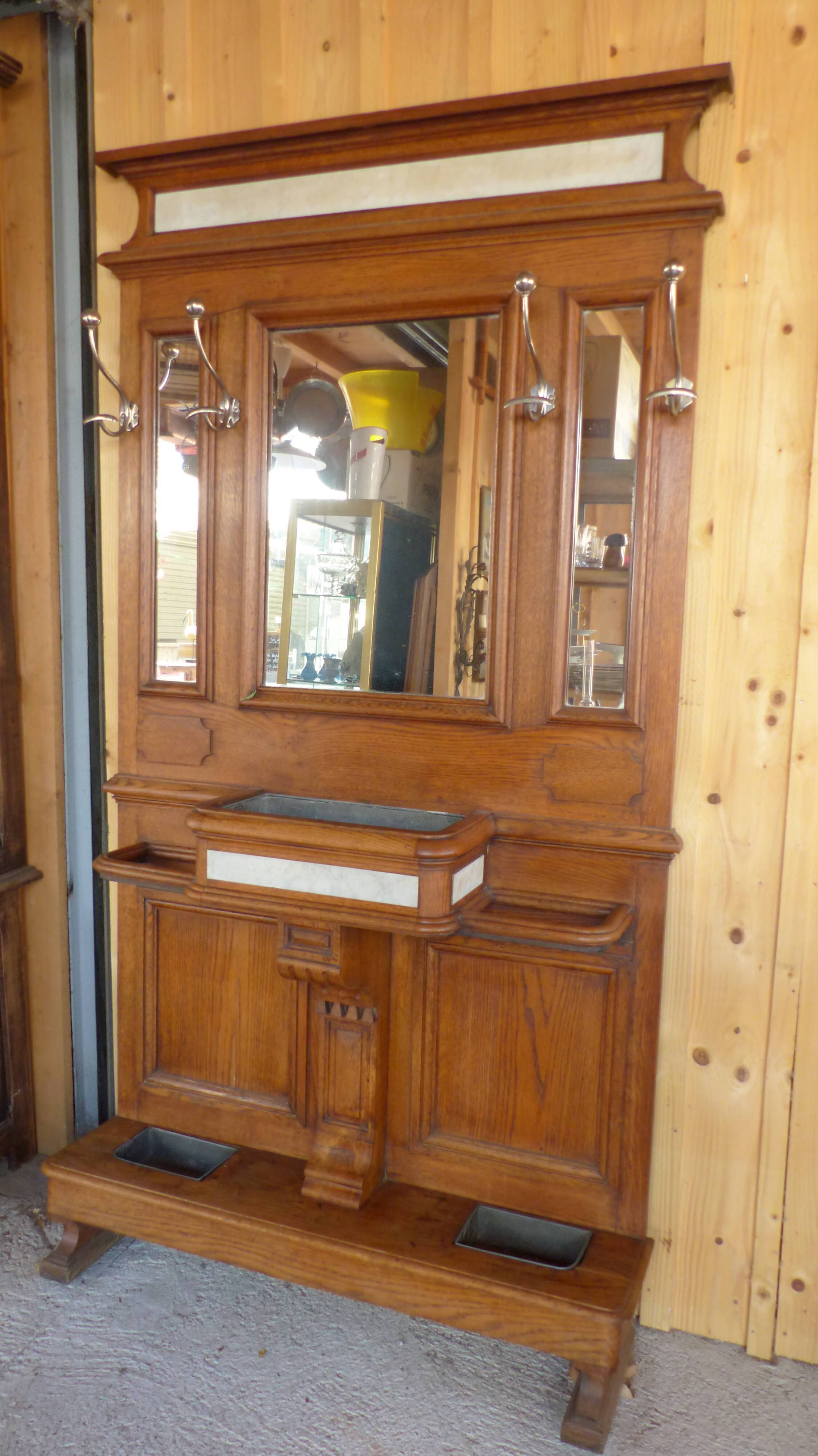 Oak and marble wall coat sores door