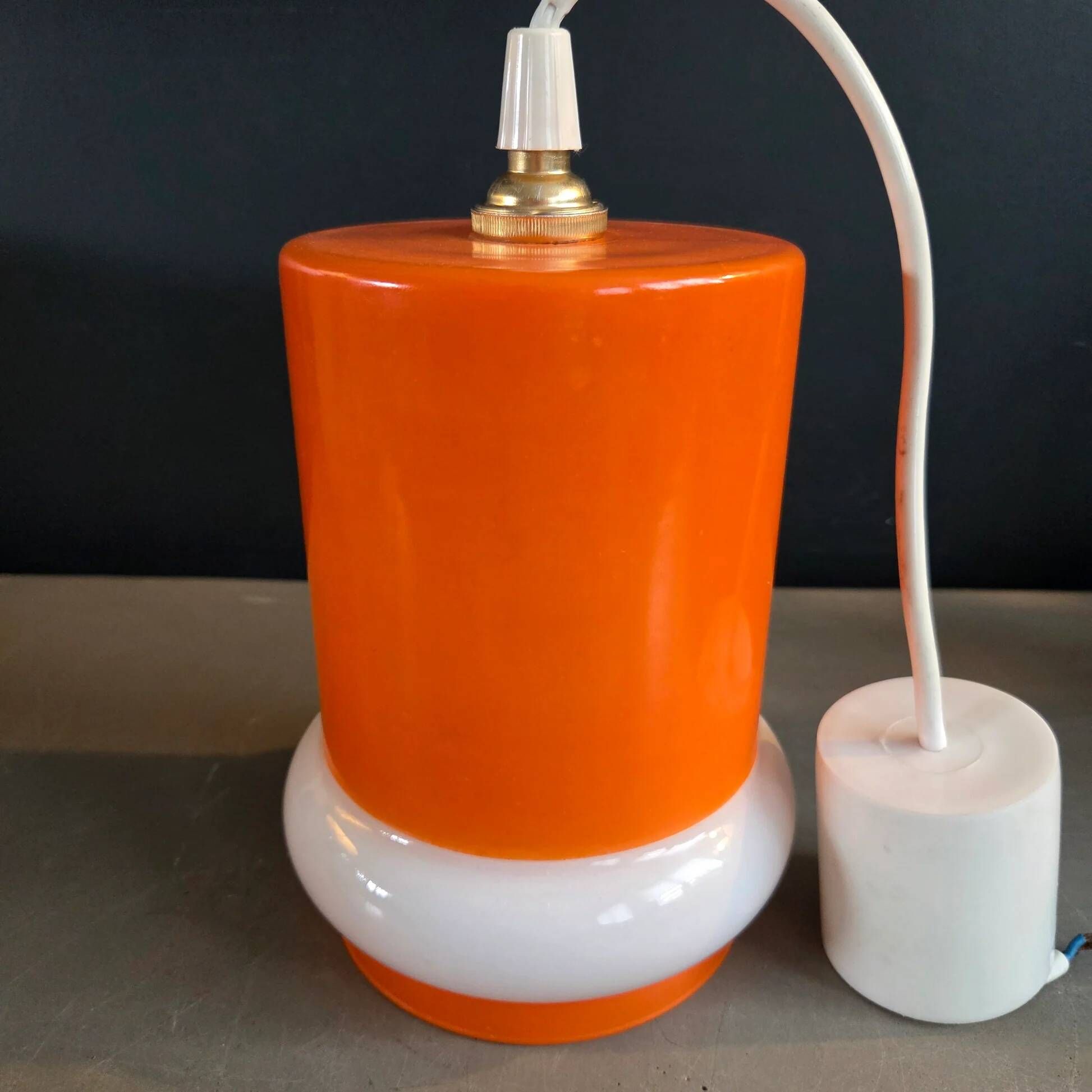 Vintage suspension in orange and white glass.