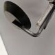 Vintage wrought-iron wall candle holder with pressed glass decoration 1970s
