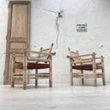 Pair of wooden armchairs and ropes