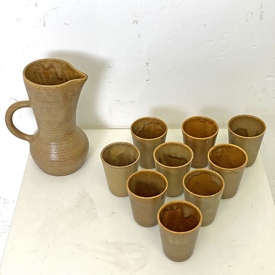 Set in stoneware carafe and 9 glasses