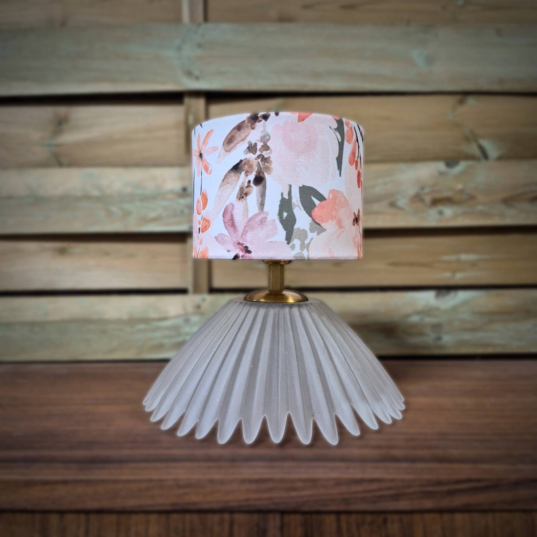 Table lamp, glass base and floral shade