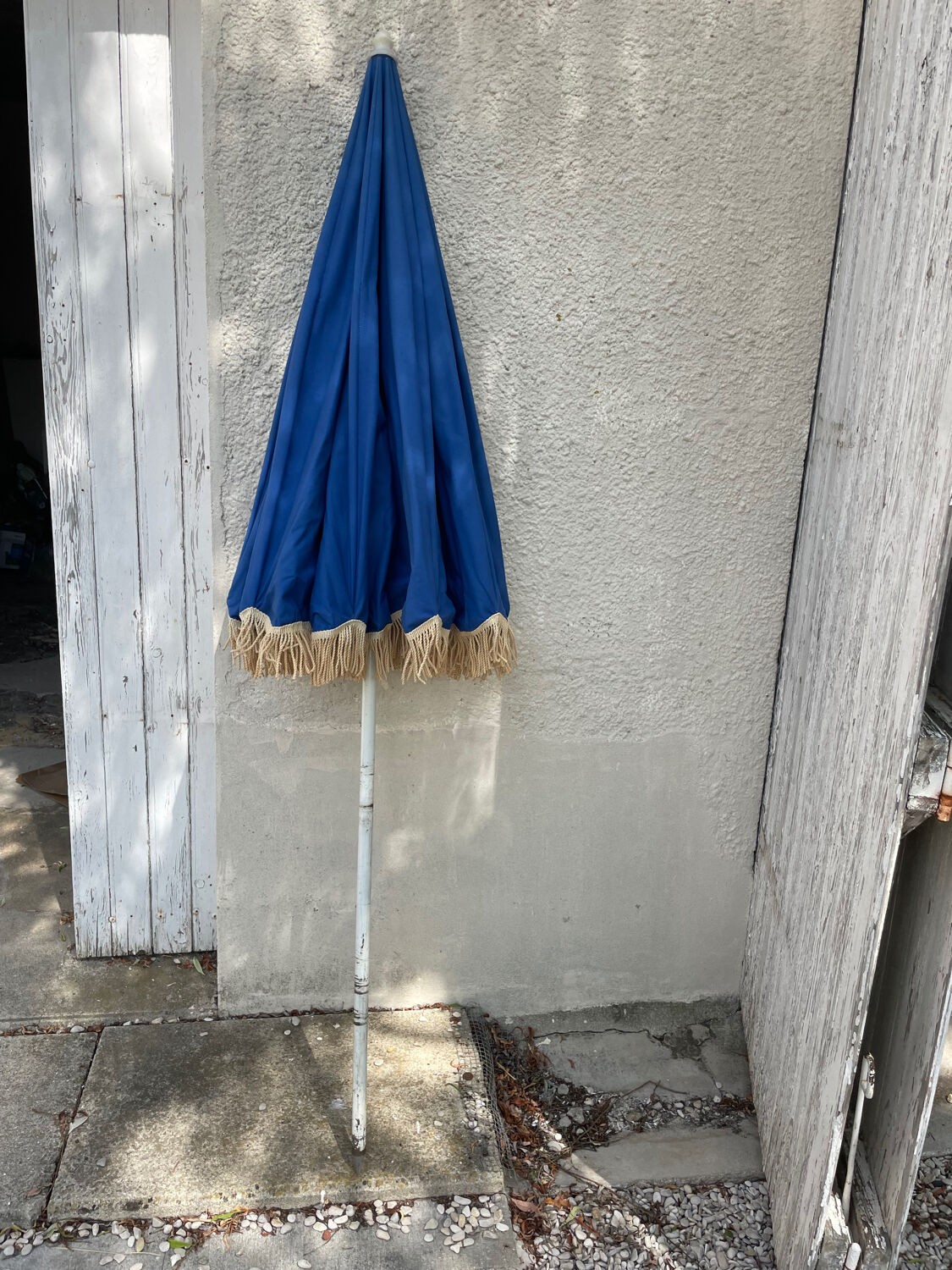 Blue parasol and flowers