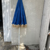 Blue parasol and flowers