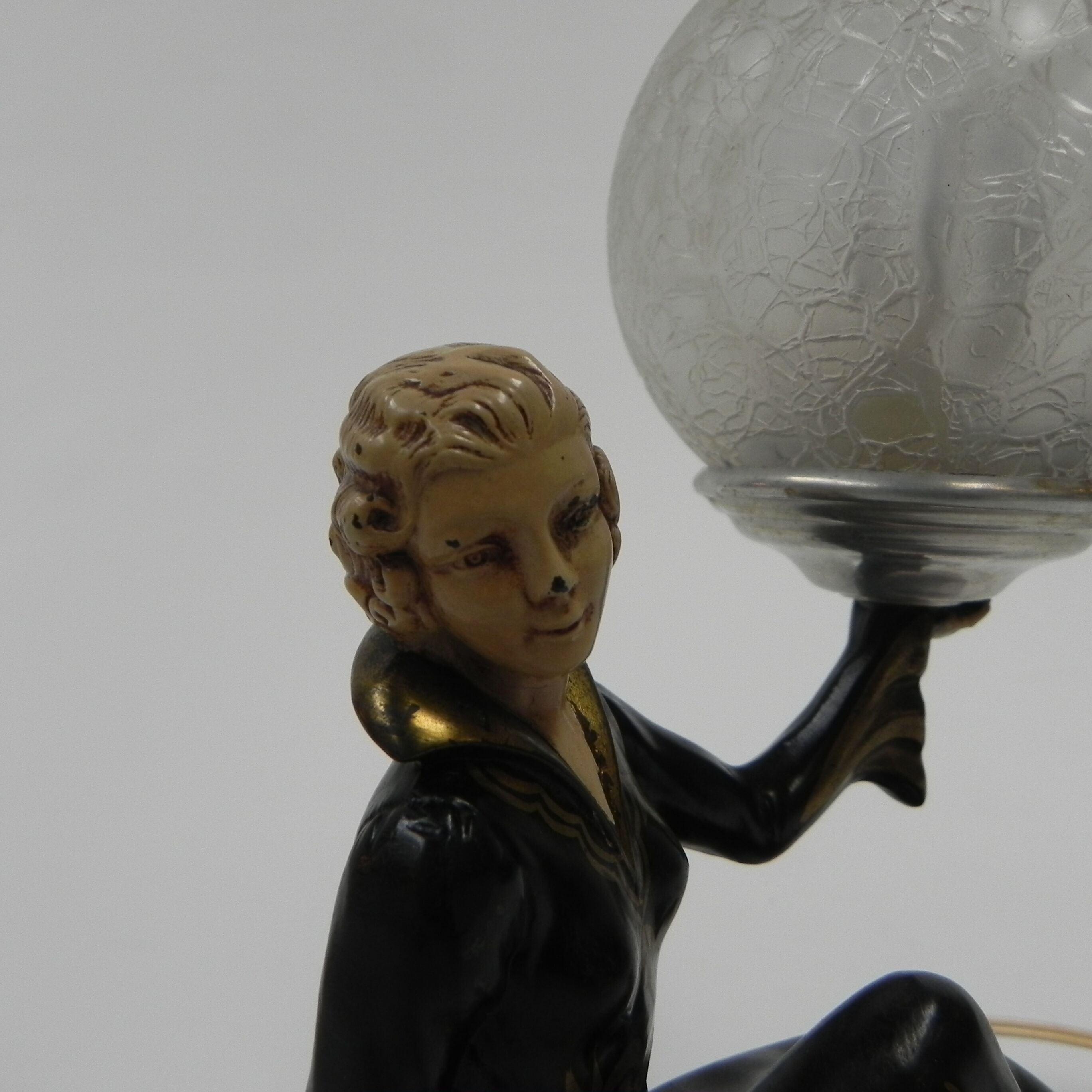 Art deco desk lamp sitting woman with globe