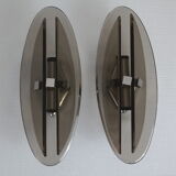 Pair of smoked glass and vintage chrome wall lamps