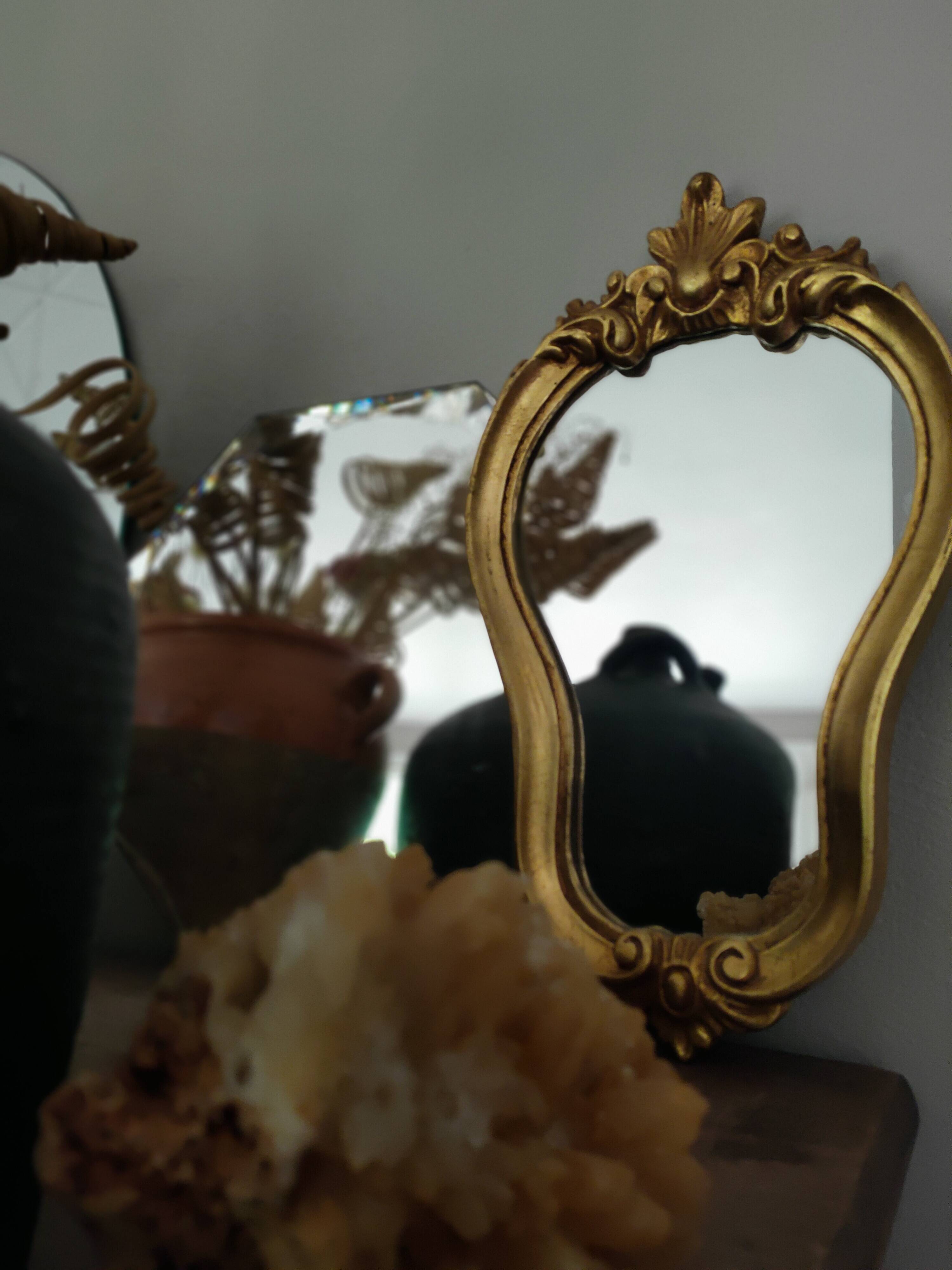 Baroque style gilded mirror.