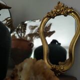 Baroque style gilded mirror.