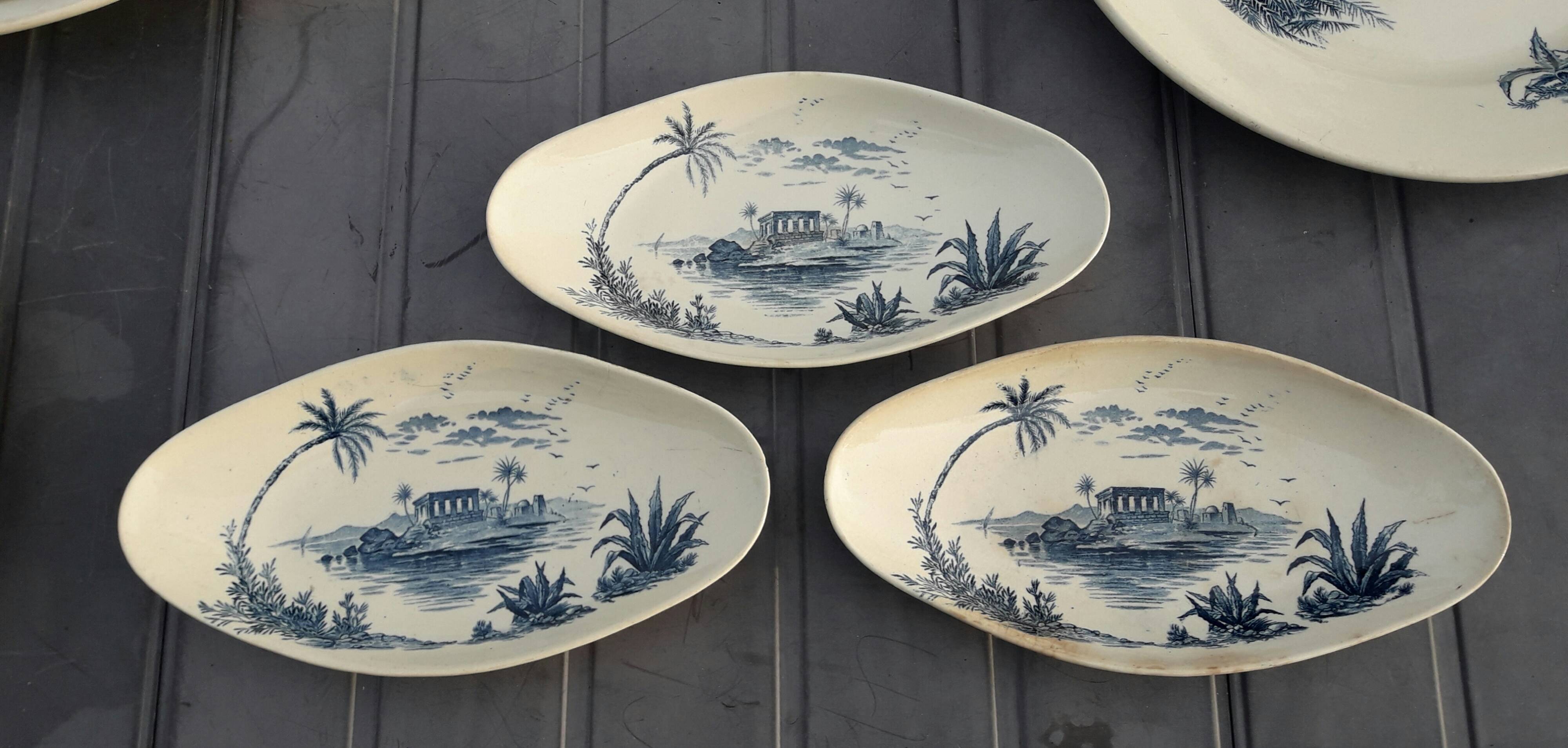 Gien earthenware service, Vues d'Orient model, 21 pieces, late 19th century