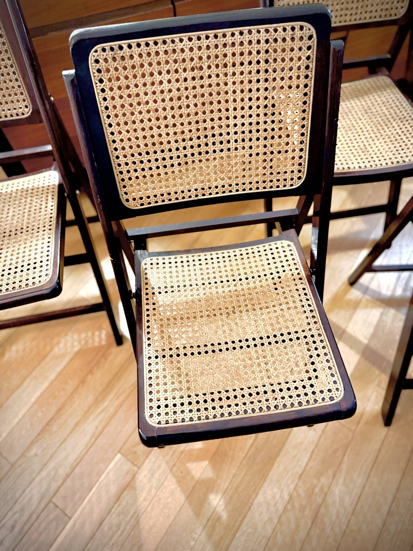vintage wooden folding chairs with caning