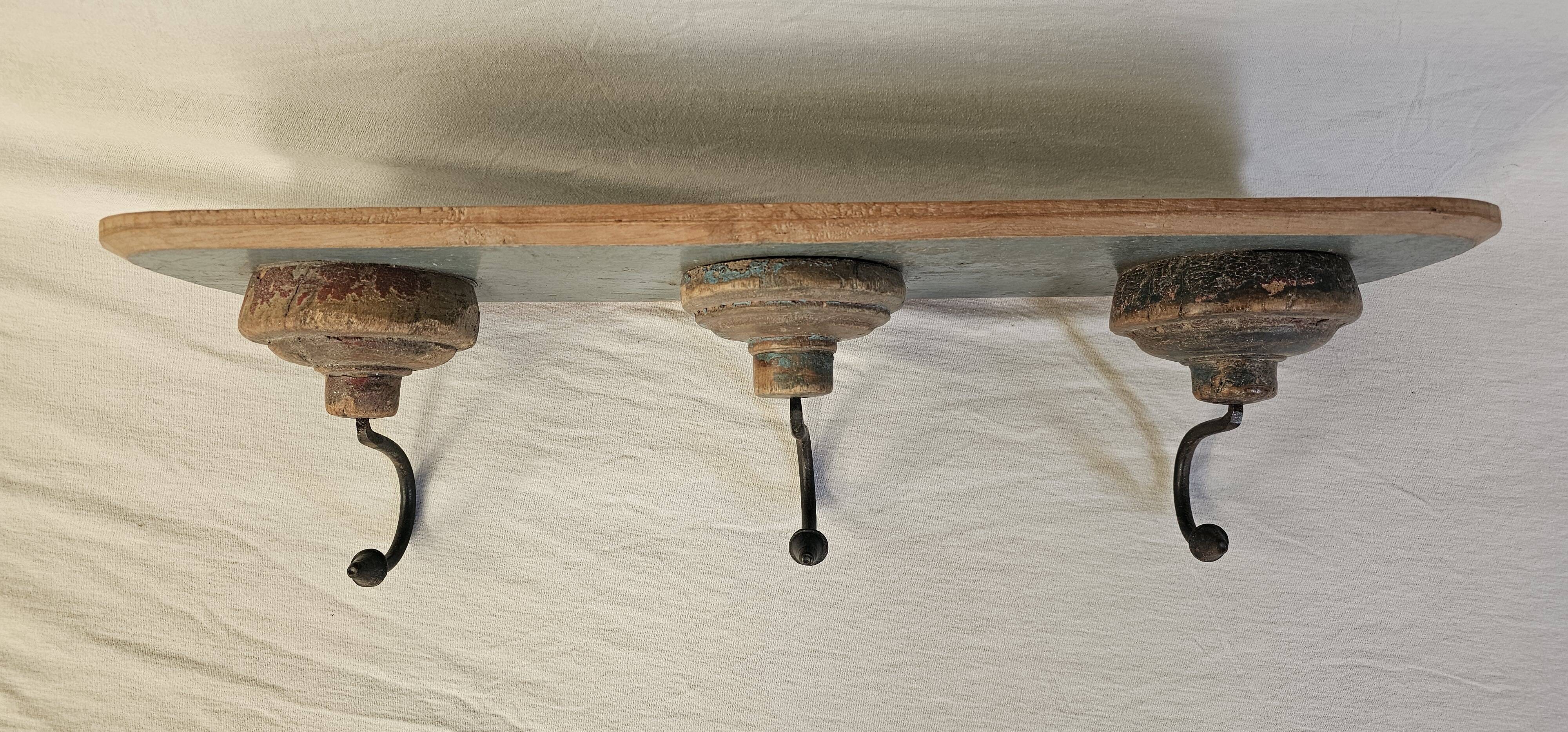 Antique teak coat rack with 3 wrought iron hooks