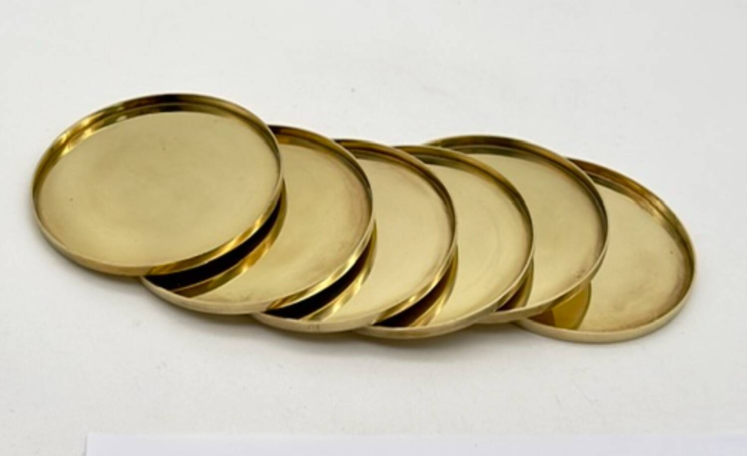 6 Coasters. Stelton. Brass