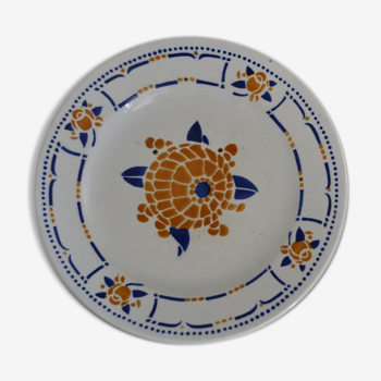 Blue, orange and blue plate with floral pattern
