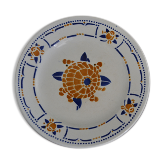 Blue, orange and blue plate with floral pattern