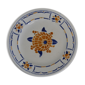 Assiette bleue, orange et bleue à motif floral