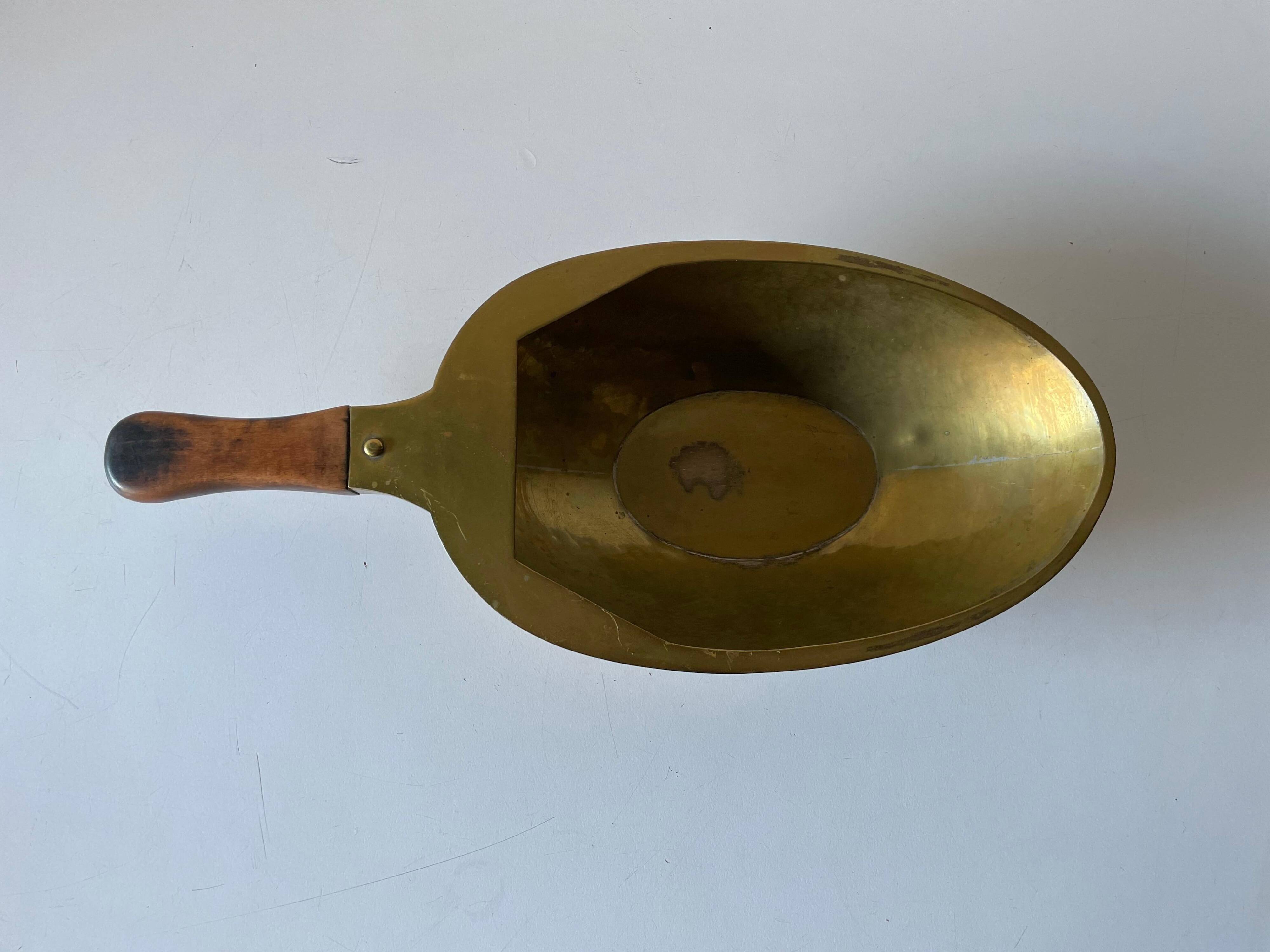Decorative brass bowl with wooden handle, 1970s, Turin, Italy.