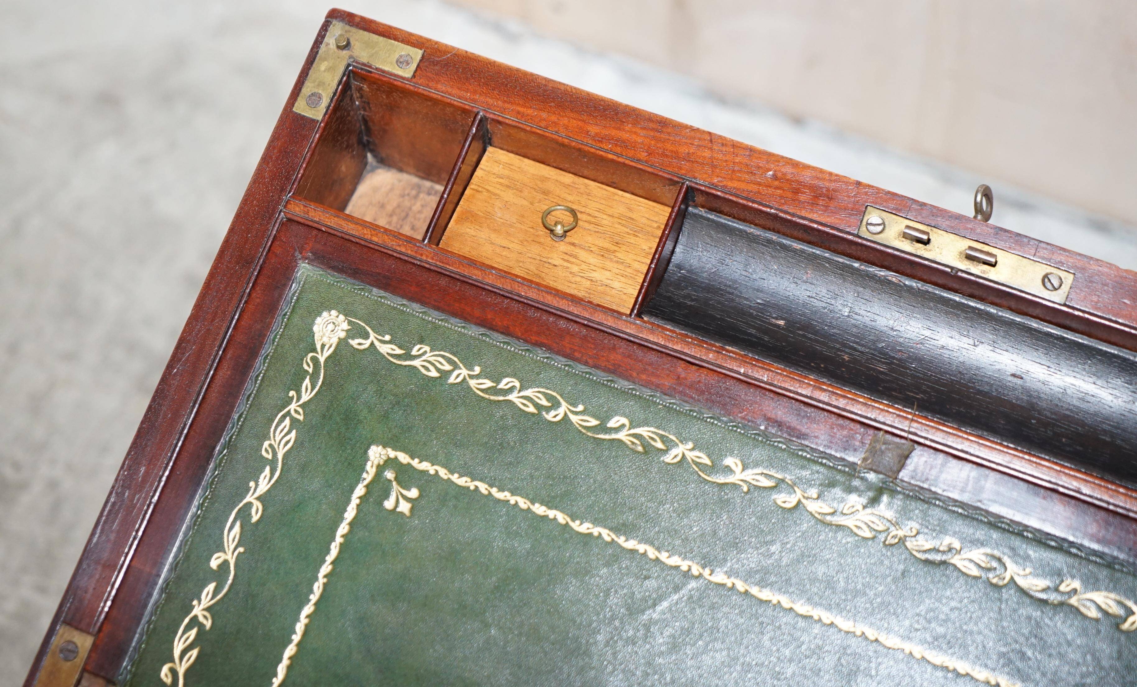 Antique hardwood military campaign desk with writing slope.