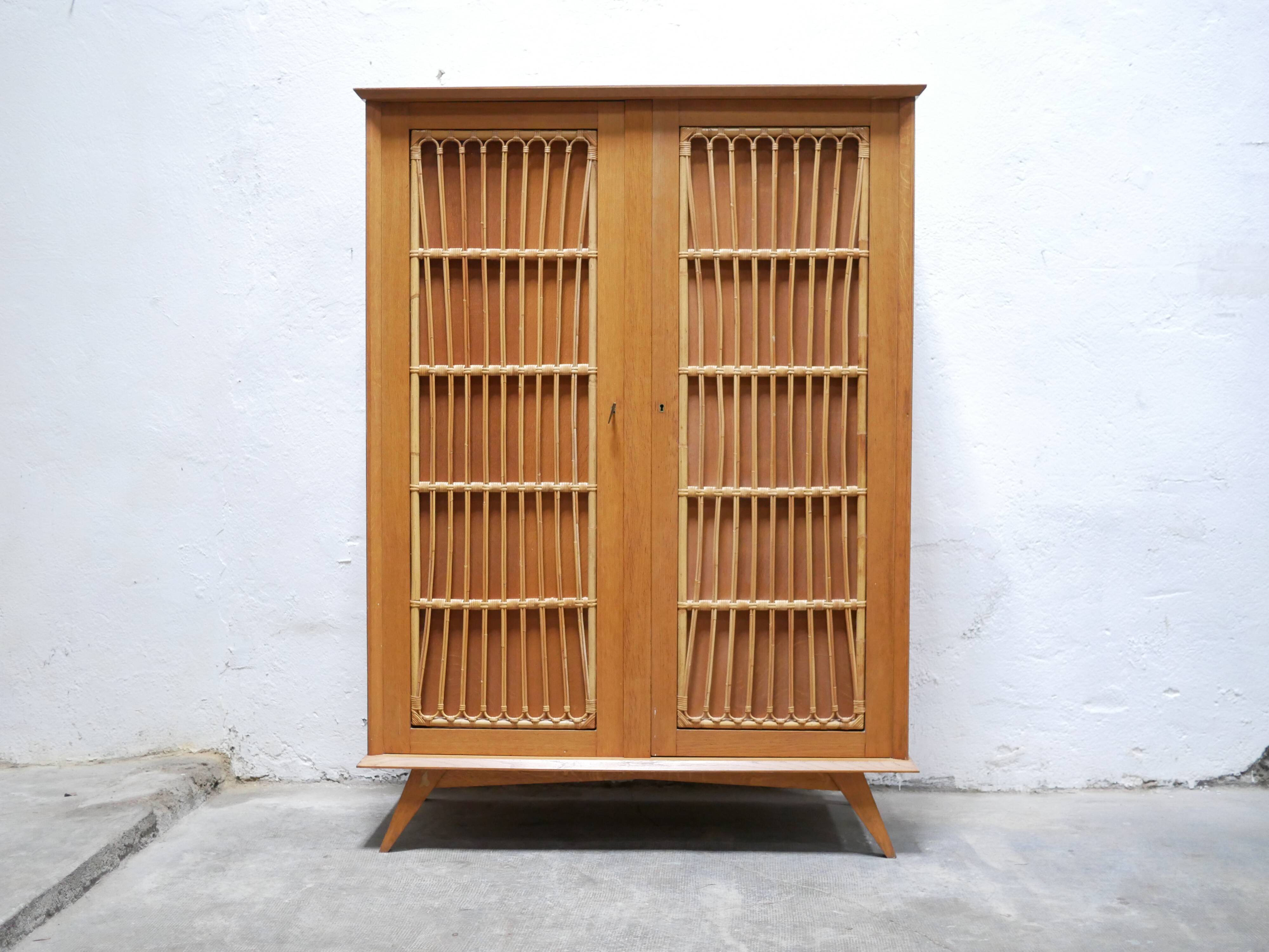 Vintage wardrobe in wood and rattan