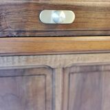 Vanity unit in solid walnut and Zimbabwean granite.