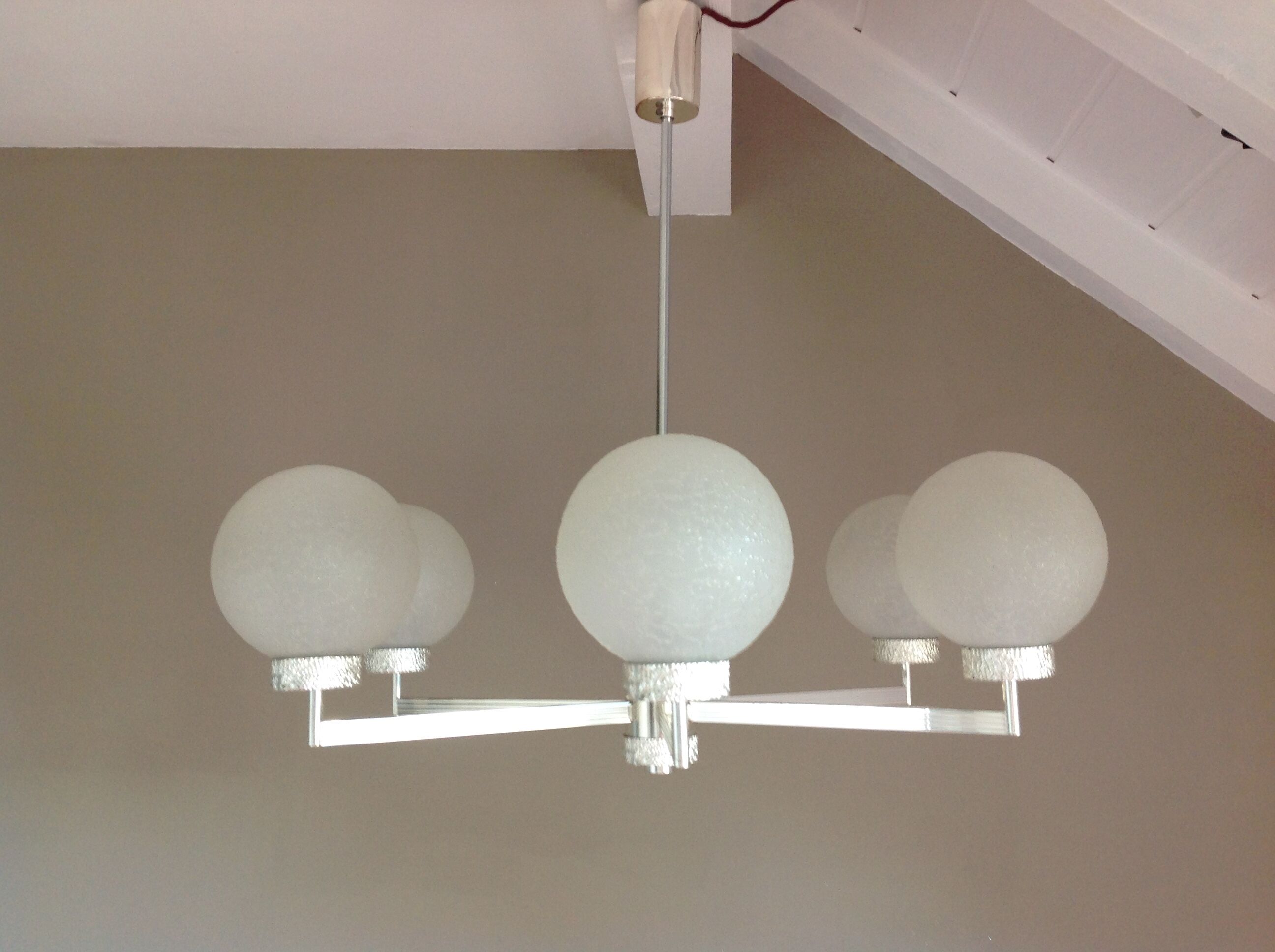 Six-light chrome metal chandelier and opaque glass globes / vintage 60s and 70s