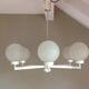 Six-light chrome metal chandelier and opaque glass globes / vintage 60s and 70s