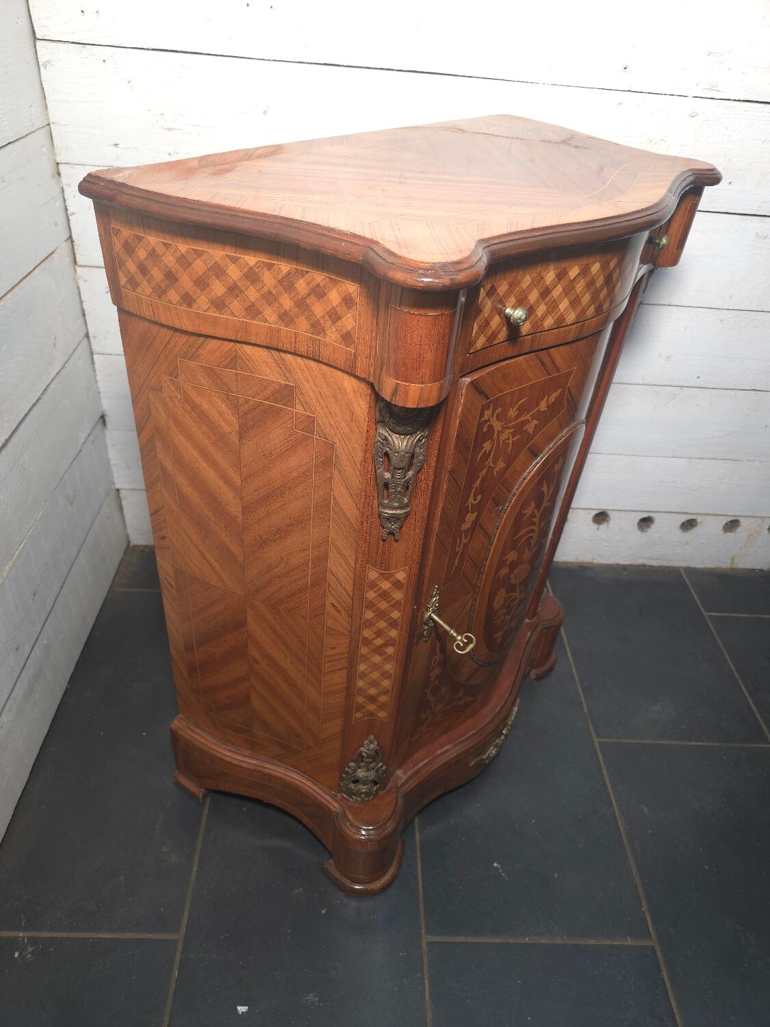 Small support table in Louis XV style with marquetry and bronze.