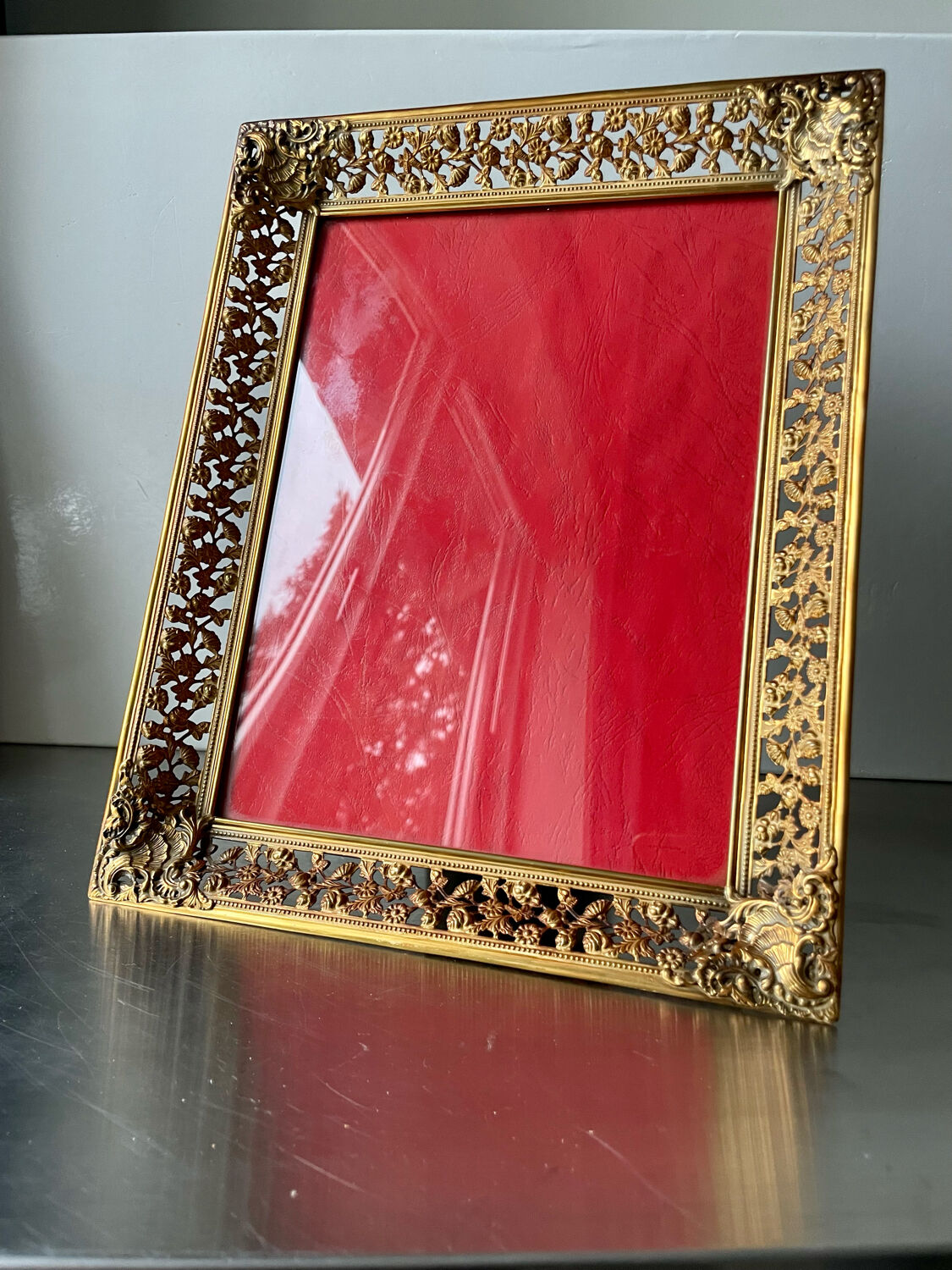 Antique xl metal frame in gold colored brass 29.5 cm x 23 cm convex glass
