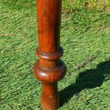 Antique solid wood table with a through drawer.