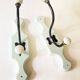 Antique metal and porcelain coat hooks, painted wooden support