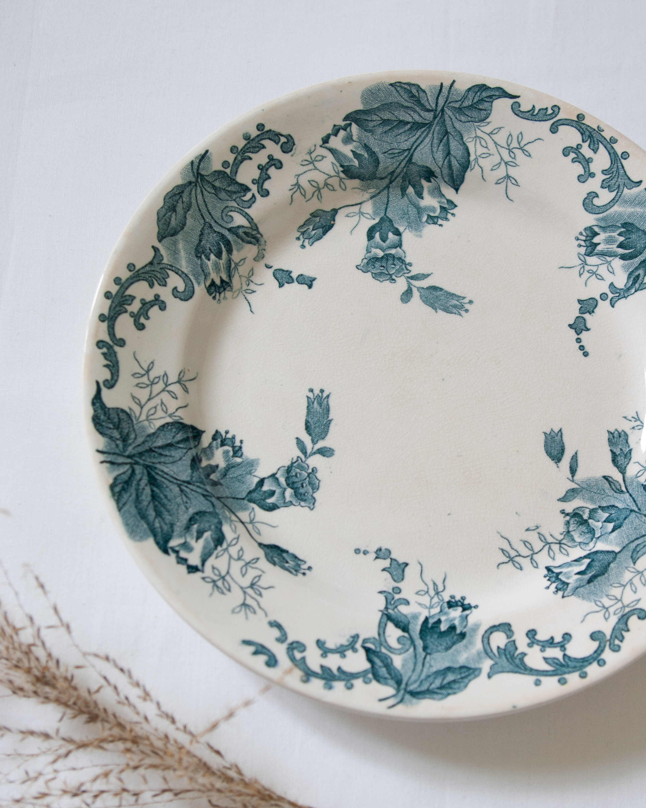 Pair of old flowered plates