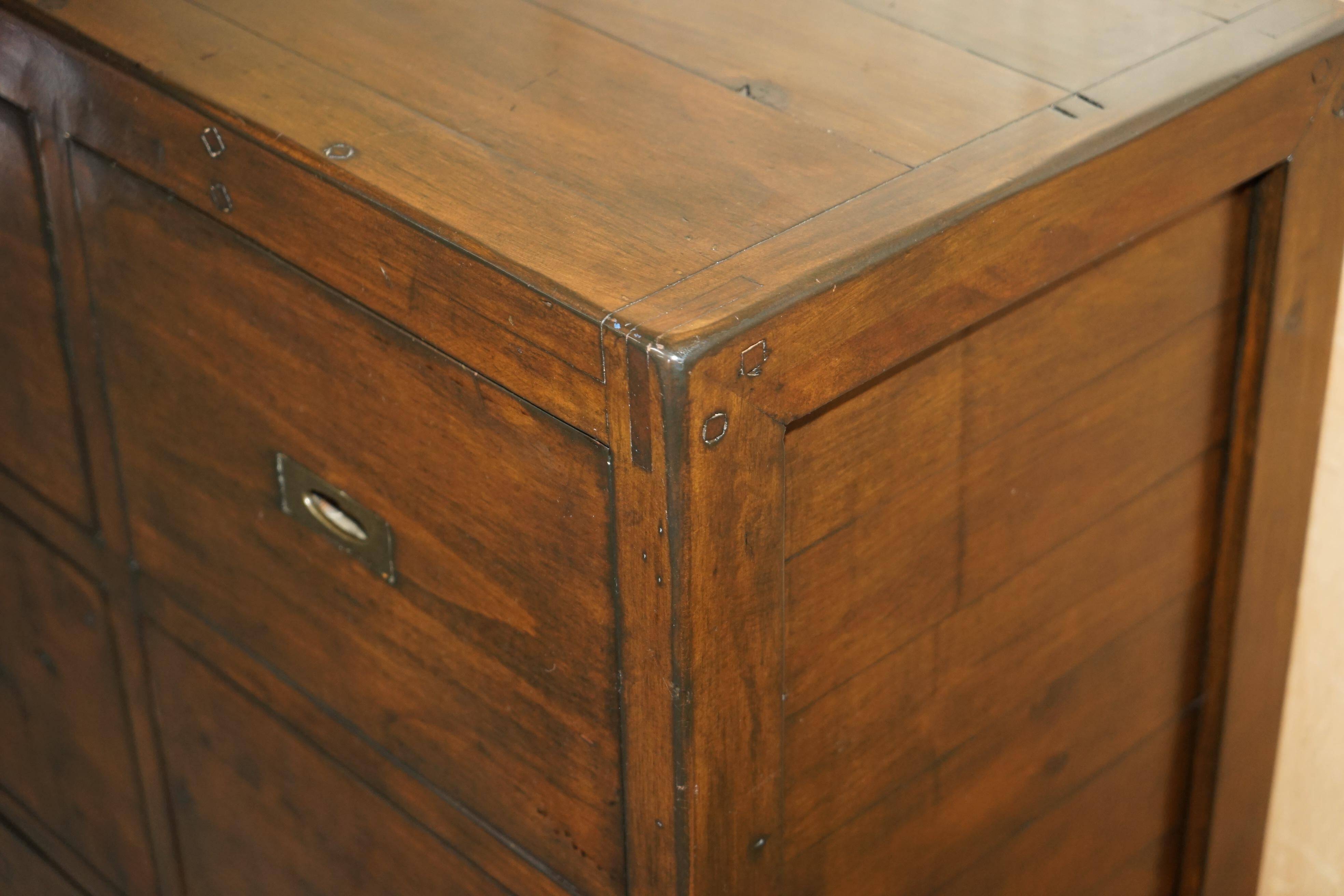 Large vintage hardwood furniture in military country style.