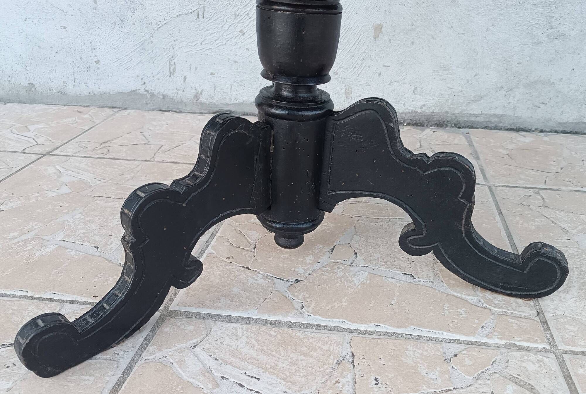 Napoleon III period gueridon in blackened wood.