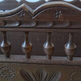 Carved wooden dolls cradle