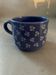 Vintage blue cup with flower decor