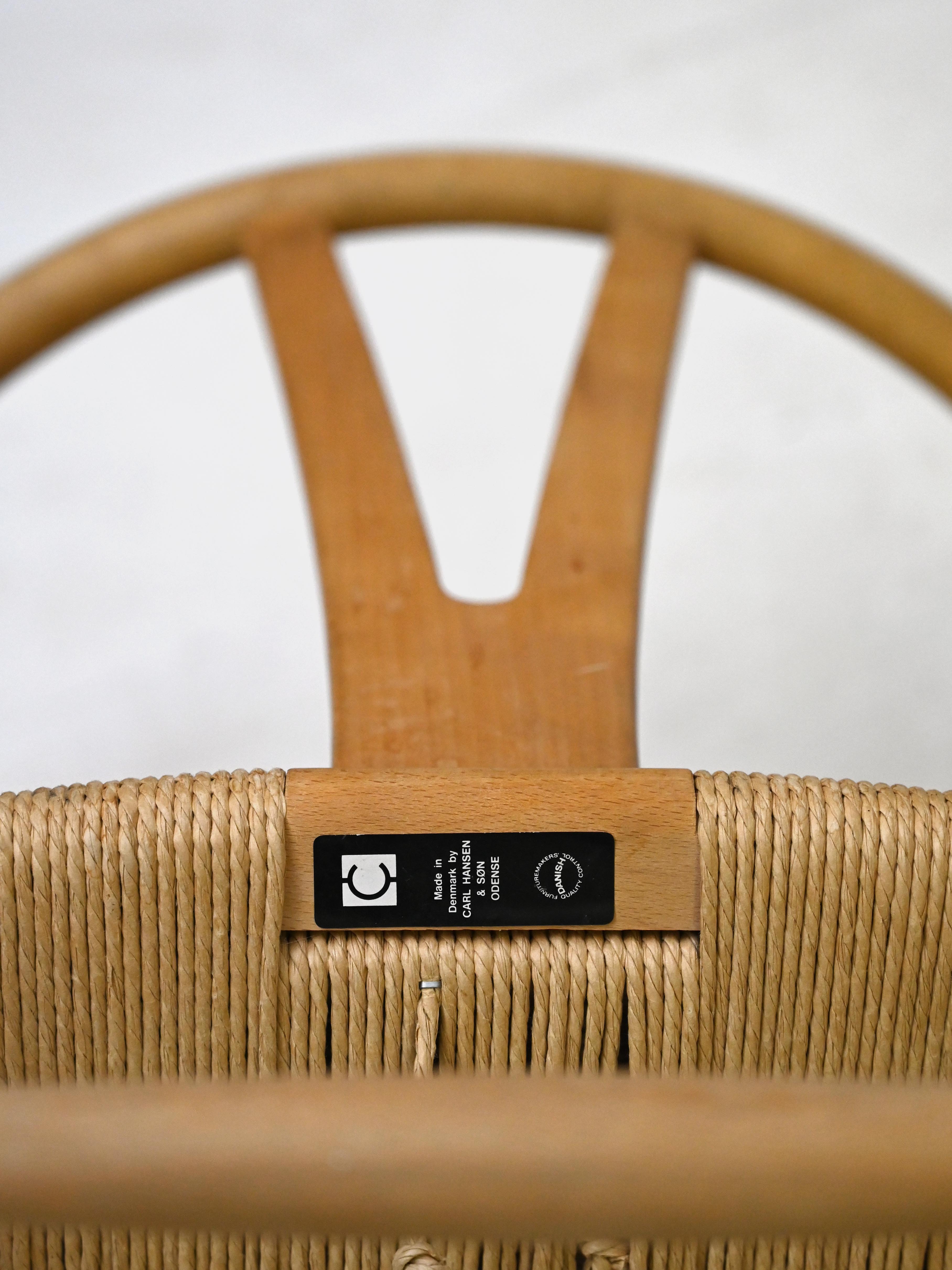 Set of six 'Wishbone chair' model chairs by Hans J. Wegner with leather cushions