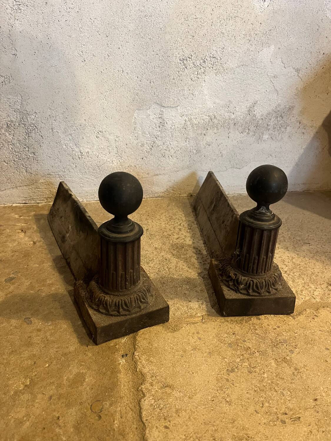Pair of cast iron ball andirons