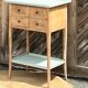 Raw wood console in water green with 4 drawers.