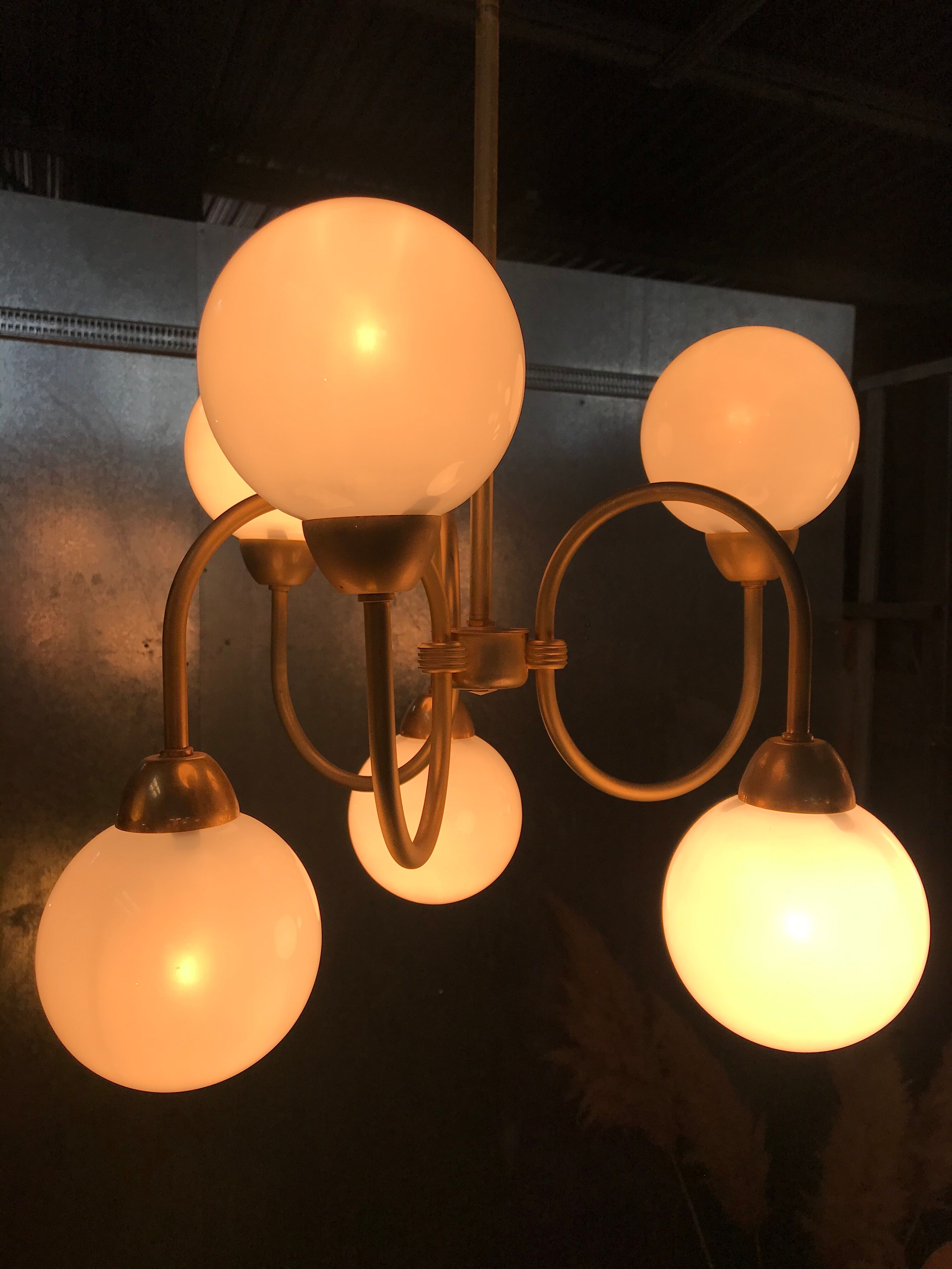 Pair of brass and opaline hanging lamps