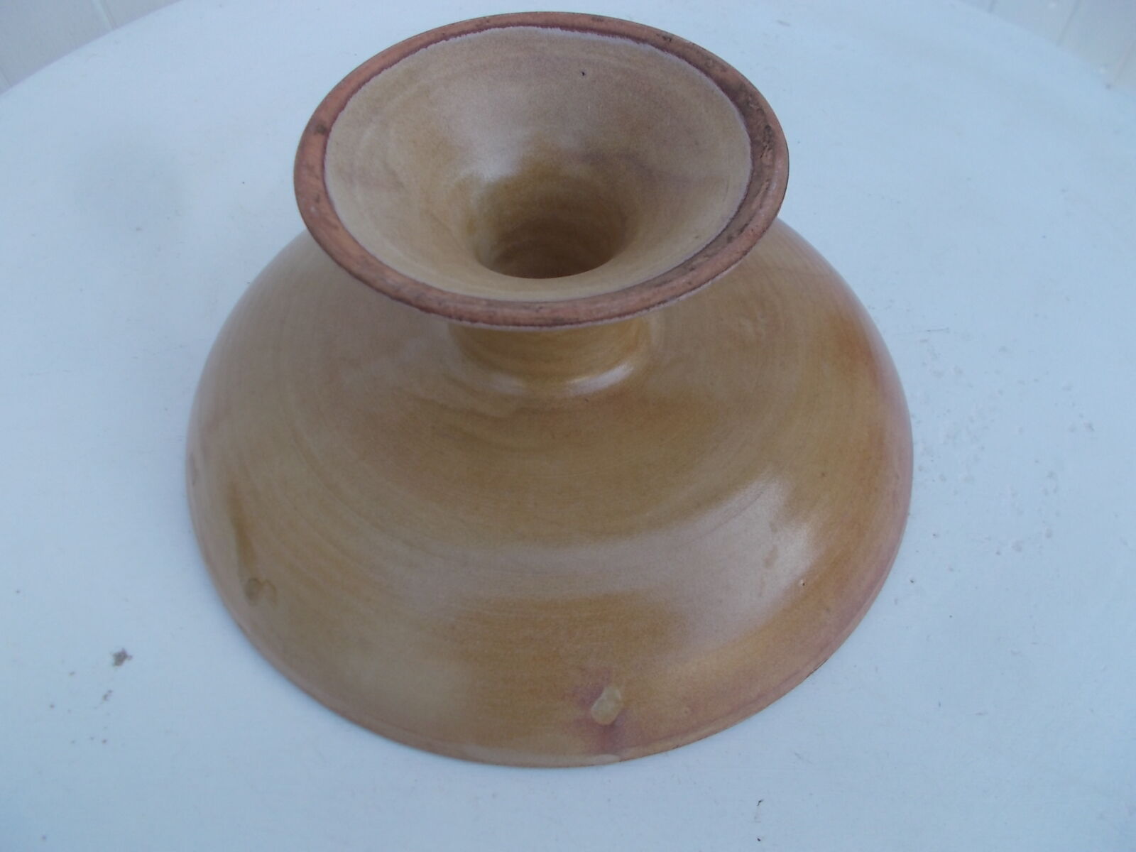 Stoneware serving dish for fruit.