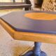 Octagonal wooden coffee table with central leg